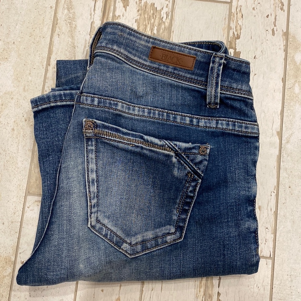 Women’s Buckle Black bootcut jeans. Size 26x32